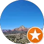 Blue sky over red rock mountains, a landscape view.